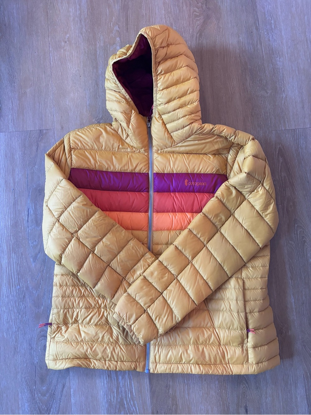 Cotopaxi Women's Yellow Hooded Packable Down Jacket with Pink Stripe